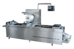 Automatic thermoform-vacuum packing machine